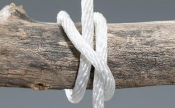 The Clove Hitch is one of the most widely used knots to fasten a rope to a post or other objects, and can be tied at any point in the rope. It is most effective for items that have constant pressure against them, such as objects that hang vertically. It's also great for clotheslines and various camp activities. HOW TO TIE: 1. Pass the end of a rope around a pole. 2. Continue over the standing end and wrap around the pole a second time. 3. Thread the end under itself and pull tight to form a clove hitch knot.